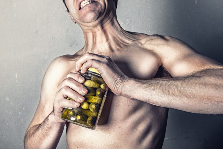 Man not strong enough to open a jar of pickles